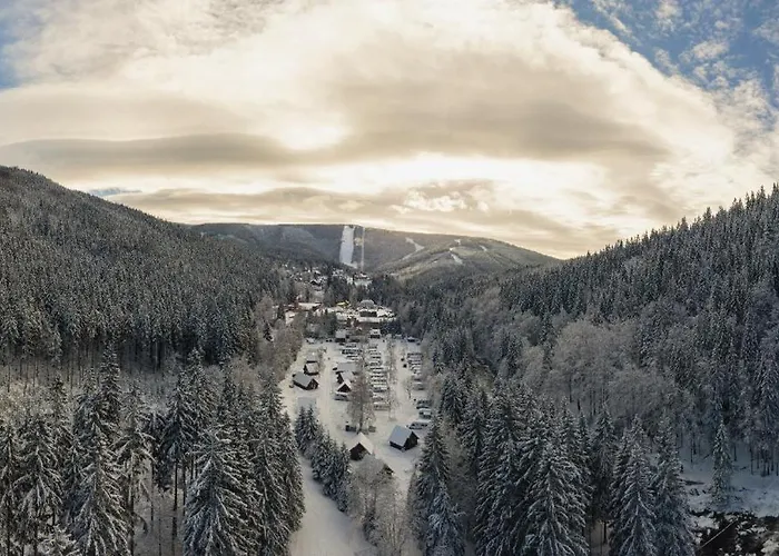 & - Base Camp Medvedin *